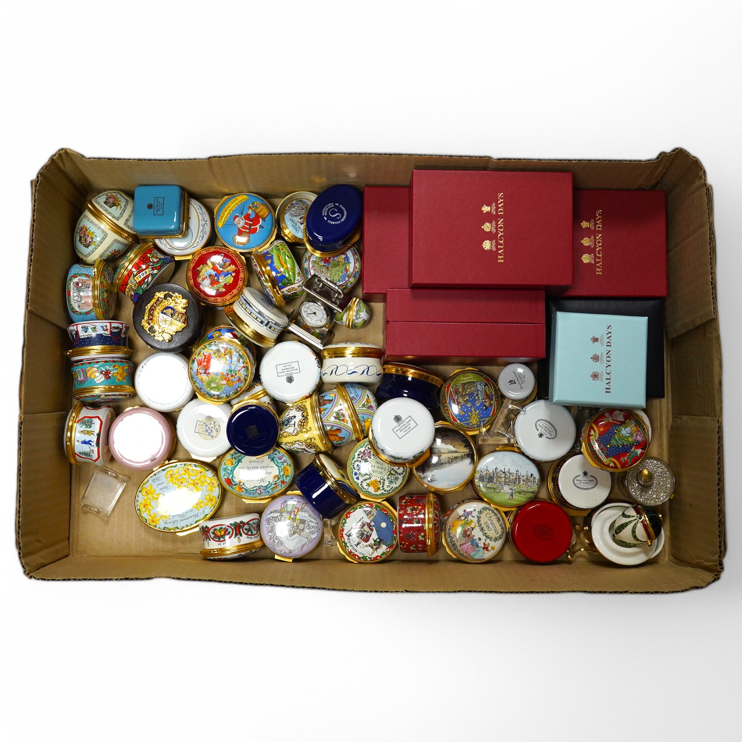 A collection of Halcyon Days enamel patch boxes, some cased. Condition - varies